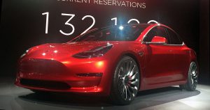 1200px-candy_red_tesla_model_3_trimmed_2